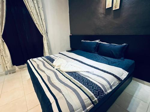 Postel nebo postele na pokoji v ubytování Kuu Inn Motel
