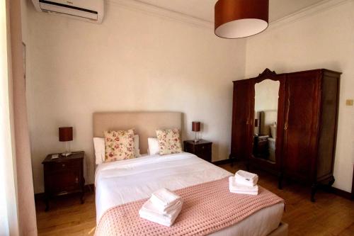 Postel nebo postele na pokoji v ubytování Apartamento do Arquinho I - by VinteOito