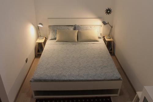 A bed or beds in a room at Ciao Belli
