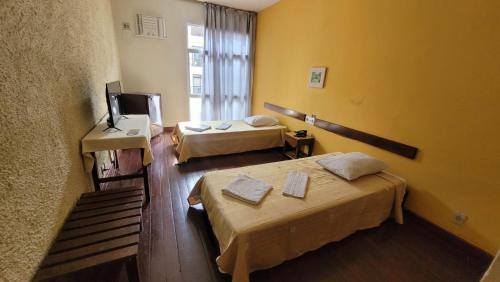 Una cama o camas en una habitación de Hotur Hotel