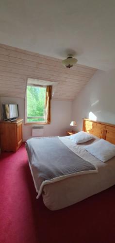 Postel nebo postele na pokoji v ubytování T4 duplex à Vielle-Aure résidence de tourisme 4*