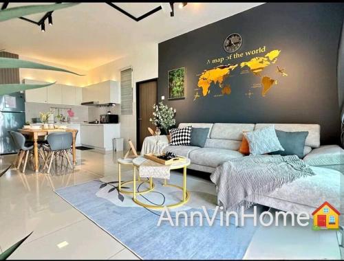 a living room with a map of the world on a wall at Novo 8 2-Bedrooms Condo Extreme City View Suite in Malacca