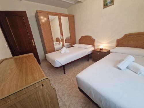 626A Tres dormitorios con garaje by R2R Consulting