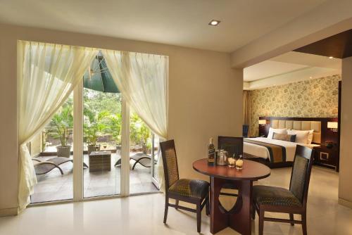 Imagen de la galería de The Acacia Hotel & Spa, en Candolim