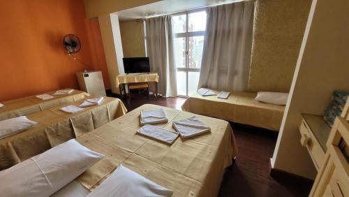 Una cama o camas en una habitación de Hotur Hotel