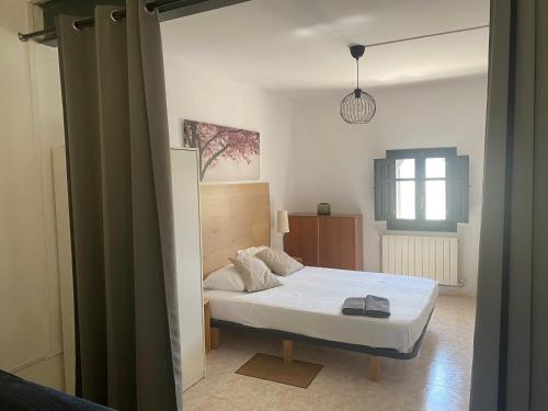 Postel nebo postele na pokoji v ubytování El Molí