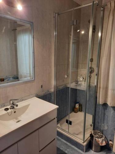 a bathroom with a shower and a sink and a showerspective at Apartamento / piso , centrico. in Santander