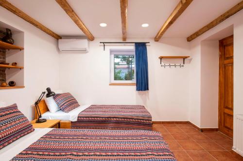 Ein Bett oder Betten in einem Zimmer der Unterkunft Your home, Lagodekhi