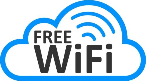 a blue cloud with the free wifi logo at Newcastle, Powburn, fully equipped kitchen 4 bedrooms, 3 king & 2 single beds in Newcastle upon Tyne