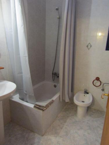 a bathroom with a shower and a toilet and a sink at Casa Antonia ET- 6805 in Sant Francesc Xavier
