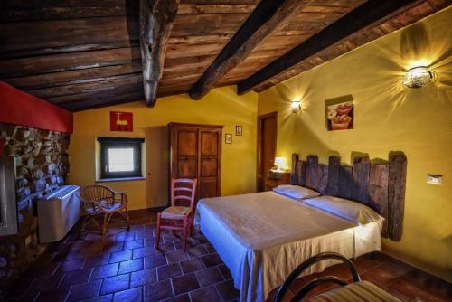 a bedroom with a bed in a room at Tenuta TerraRossa in Rossano