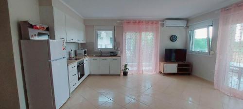 Kuchyň nebo kuchyňský kout v ubytování Fanari holiday apartaments