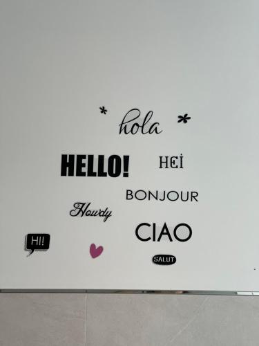 a wall with a sign on it with words on it at Cedemar 2 in Cedeira