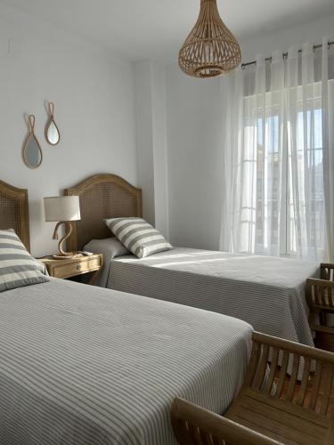 A bed or beds in a room at Sol y mar