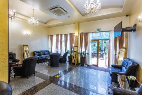 a waiting room with couches and chairs at Viand Hotel - Premium All Inclusive in Sunny Beach