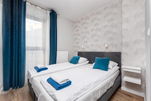 Posteľ alebo postele v izbe v ubytovaní Chłodna Apartment by Your Freedom