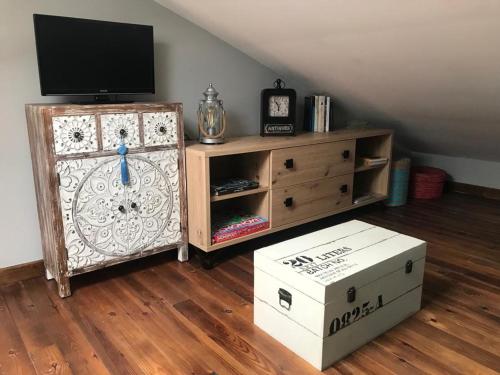 TV a/nebo společenská místnost v ubytování Casa Conchido