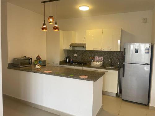 Köök või kööginurk majutusasutuses Al-rehab residence