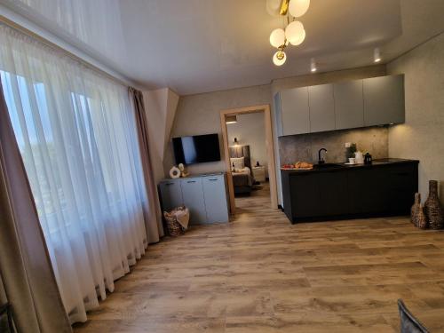 Kuchyň nebo kuchyňský kout v ubytování Villa Verona