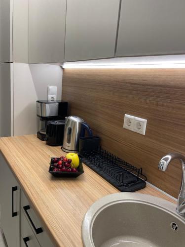 Kuchyň nebo kuchyňský kout v ubytování Plagia Relax Hotel