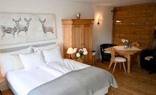 Postel nebo postele na pokoji v ubytování Residence Au Reduit Sankt Moritz