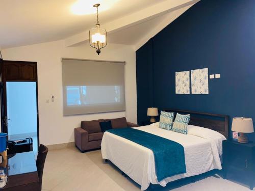 Giường trong phòng chung tại Hotel Gran Costa Azul