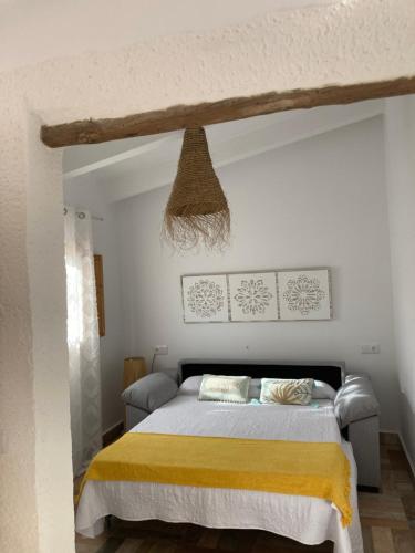 Säng eller sängar i ett rum på Finca el atardecer - Apartamento Sol