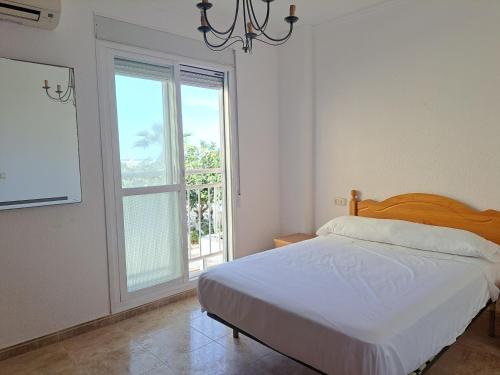 Postel nebo postele na pokoji v ubytování Apartamento Paseo del Malecón - Garrucha