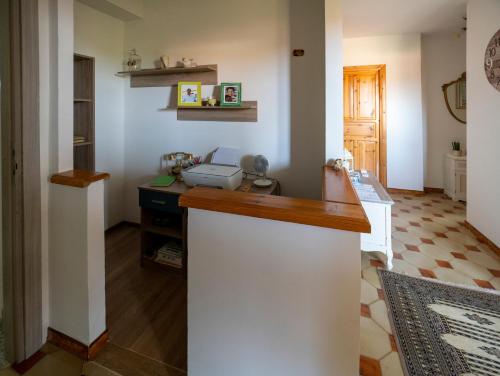 Кухня или мини-кухня в B&B Da Laura San Teodoro
