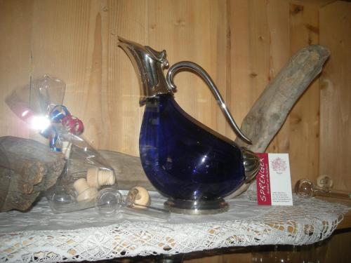 a blue vase sitting on top of a table at Gasthof Sprenger in Sillian