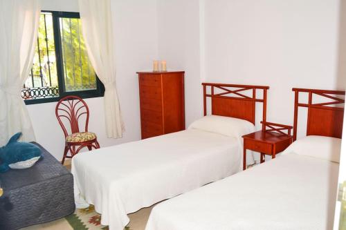 Postel nebo postele na pokoji v ubytování Malaga Marbella Elviria Apartment Golf