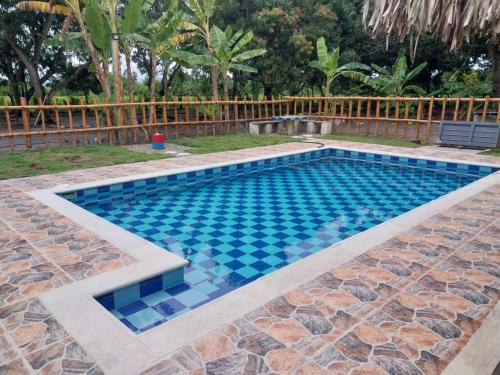 Kolam renang di atau dekat dengan Finca Agroturística La Sultana
