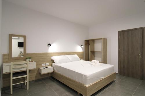 Ένα ή περισσότερα κρεβάτια σε δωμάτιο στο Hotel Villa Adrian