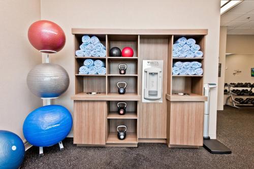 a shelf in a room with plates and balls at Residence Inn by Marriott Austin Southwest in Austin