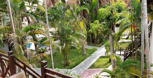 an overhead view of a garden with palm trees at Natural Relax Villa in Siem Reap