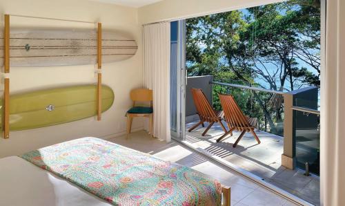 Ένα ή περισσότερα κρεβάτια σε δωμάτιο στο Little Cove Court - Apt 9