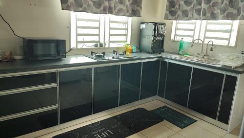 Dapur atau dapur kecil di Homestay Uni, Kuala Kedah