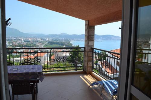 a balcony with a view of the water at Apartments Milosevic in Bar