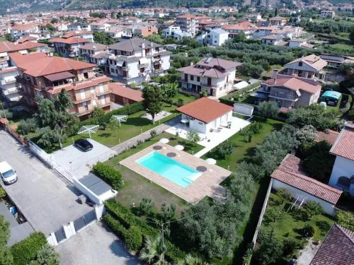 an aerial view of a house with a swimming pool at STRAPALU' in Fondi