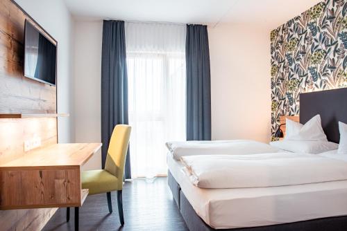 Un ou plusieurs lits dans un hébergement de l'établissement Alb Inn - Hotel & Apartments