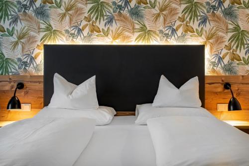 Un ou plusieurs lits dans un hébergement de l'établissement Alb Inn - Hotel & Apartments