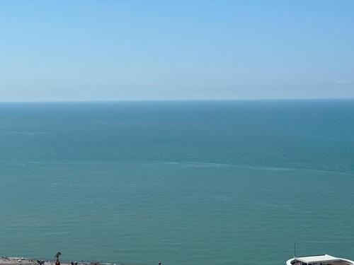 a view of the ocean from a beach at Moonlight Apart-Hotel Batumi in Batumi