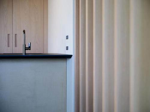 a kitchen with a sink and a counter top at VillasGarda - Villa Bardolino in Bardolino