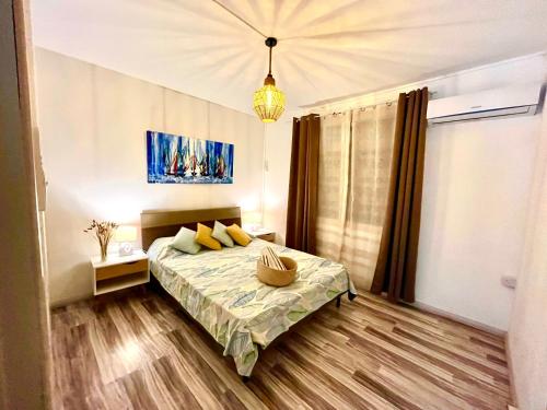 Un pat sau paturi într-o cameră la La Residence Mauritius