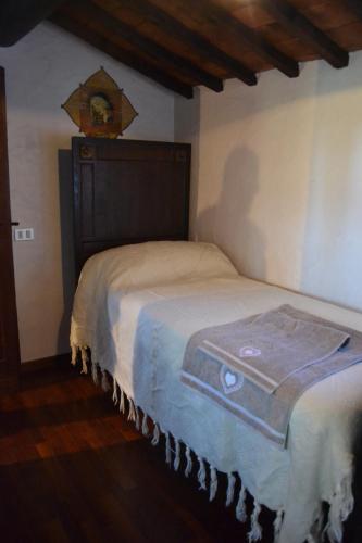 Katil atau katil-katil dalam bilik di Cortona Holiday Home