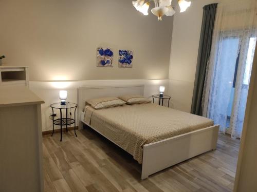 Postel nebo postele na pokoji v ubytování Casa Simo