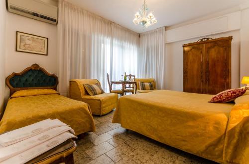 Letto o letti in una camera di Hotel Ariel Silva