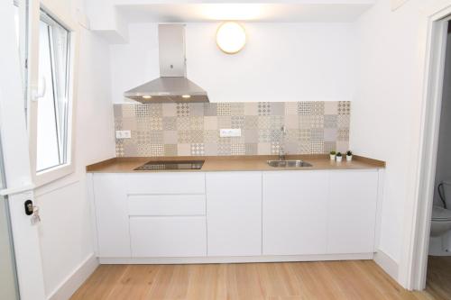 Kuchyň nebo kuchyňský kout v ubytování Apartamentos Atlantida