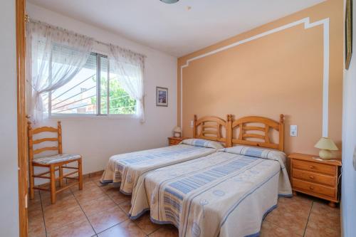 A bed or beds in a room at Marblau 3