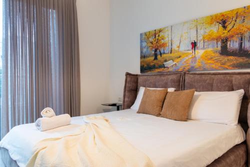 Llit o llits en una habitació de O&O Group - Prestigious Beachfront Villa W Private Pool